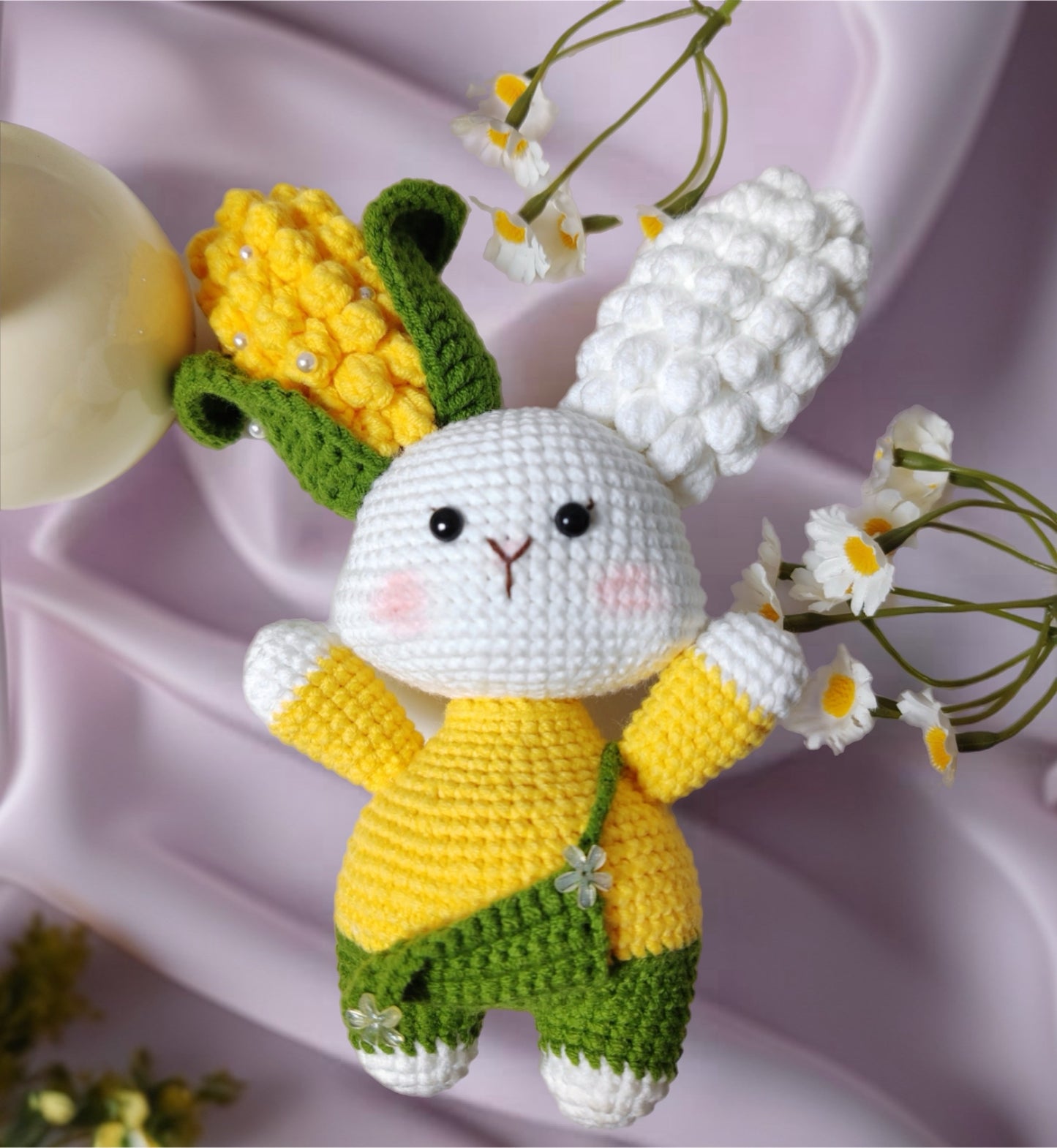 Hand-crocheted bunny doll with corn-shaped ears