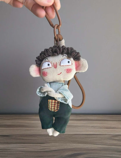 Boy in green overalls fabric doll