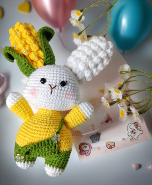 Hand-crocheted bunny doll with corn-shaped ears